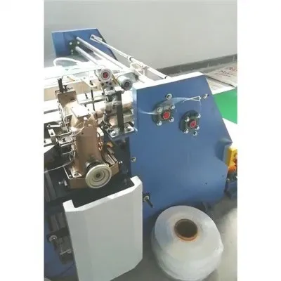 Topeltõmblusega lõikamis- ja õmblusmasin